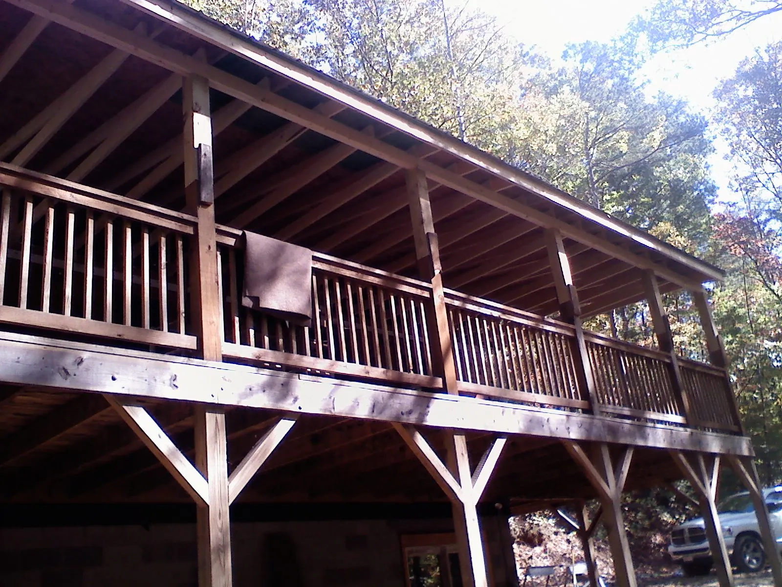 Timber framing under a new elevated porch and deck — Roof Leak Repair in Green Lake by Roofing Brothers
